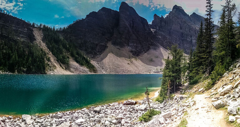 Great conditions along the shores of Lake Agnes, looking back at Mt Whyte and the Devil's Thumb. 