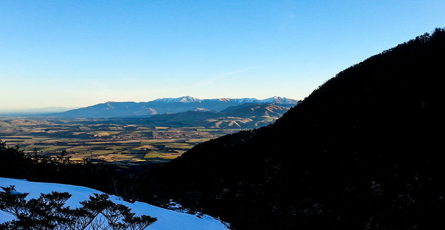 The view across the plains in the warm orange sunset.